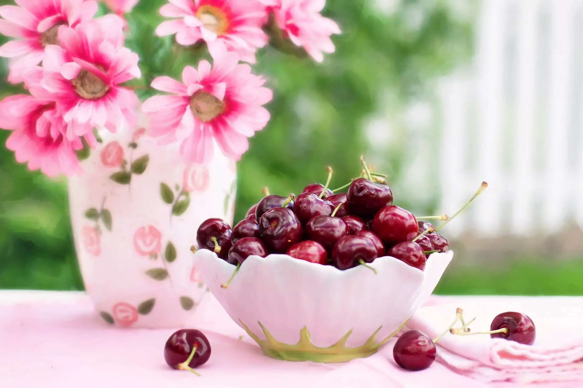red cherries on bowl